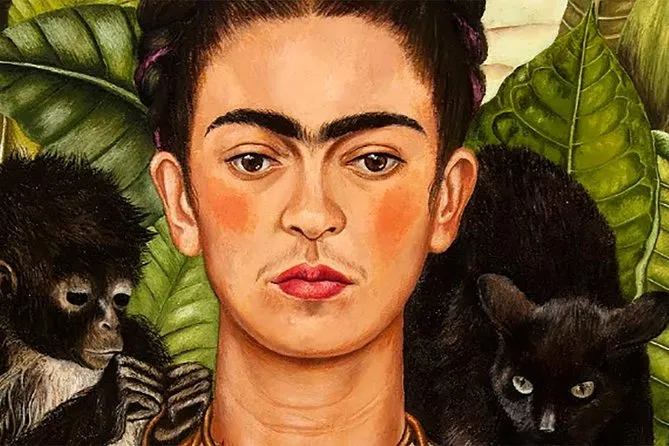 Expert guide leading a small group of ten visitors through the intimate rooms of the Frida Kahlo Blue House museum, Coyoacán Mexico City